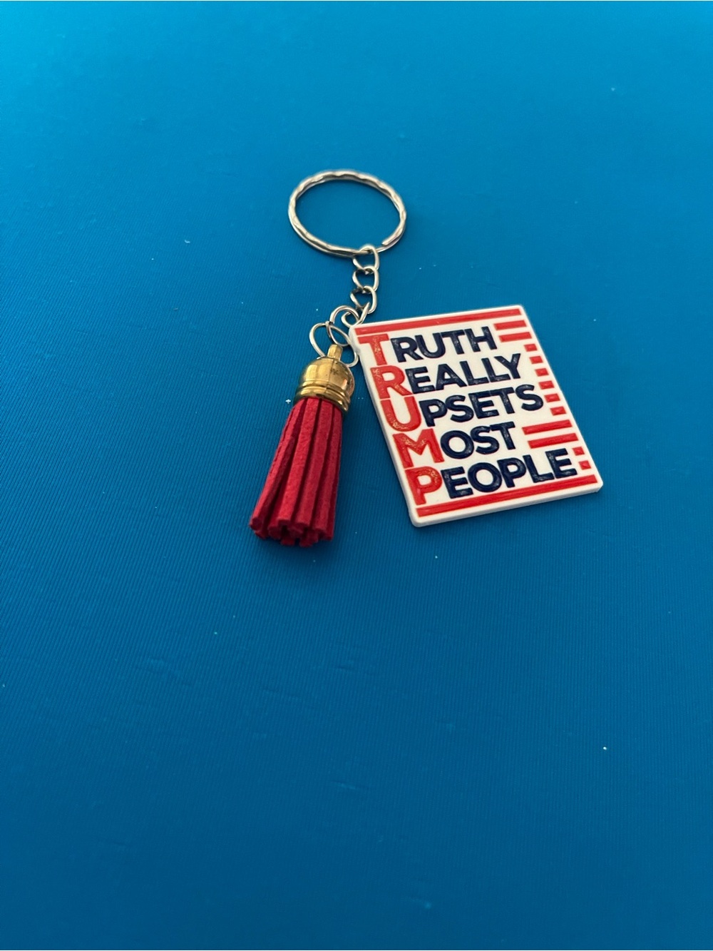 Red Tassel Keychain with Patriotic Message
